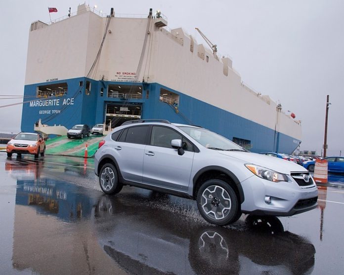 A NEW Subaru XV Crosstrek vehicle is seen being driven off the ship in a delivery from Japan at the Port of Davisville at Quonset Business Park. The port had its fifth consecutive record-breaking year for automobiles imported by ship in 2014, according to Gov. Gina M. Raimondo.

 / PBN FILE PHOTO/MICHAEL SALERNO 