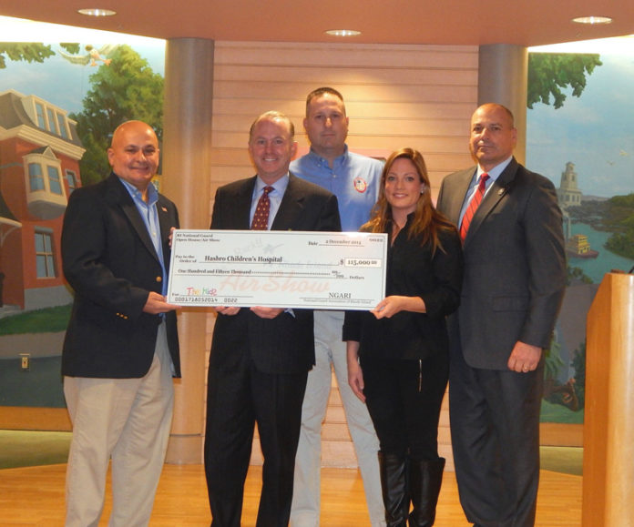 FROM LEFT: Colonel Bob Germani, director of the Rhode Island Air Show; Dr. Timothy J. Babineau, president and CEO of Lifespan; Michael Martin, business manager, National Guard Association of Rhode Island; Jen McPherson, Rhode Island Air Show liaison to Hasbro Children’s Hospital; and Denis Riel, president of the association; pose for a photo after NGARI presented a $115,000 check to the hospital. The proceeds were raised from the association’s annual air show.