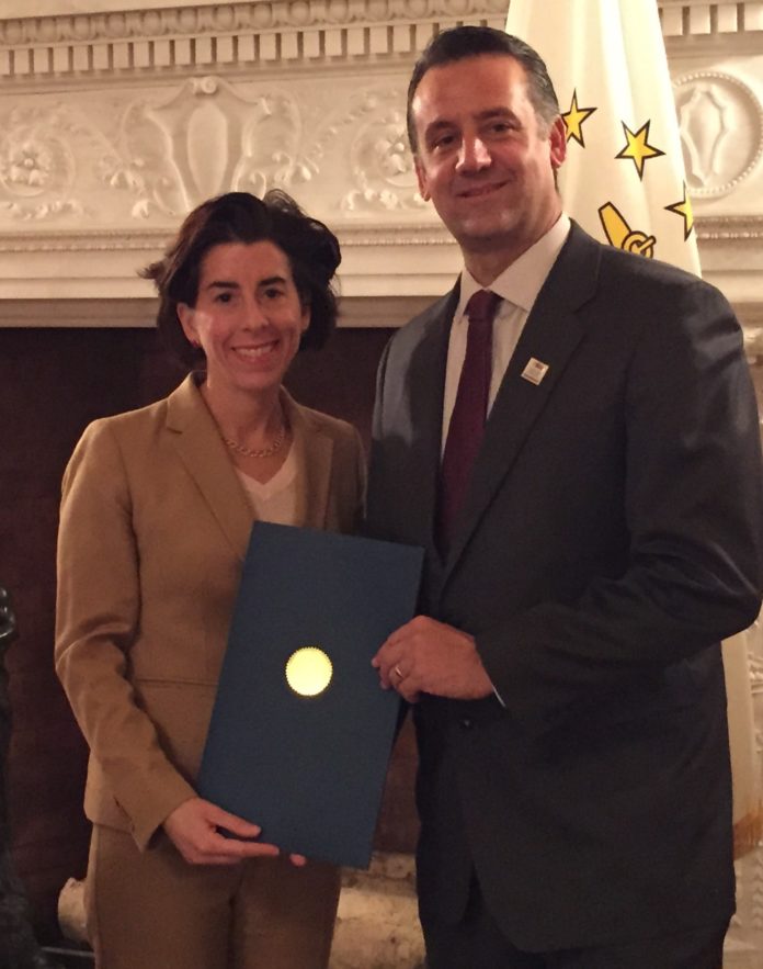 GOV. GINA M. RAIMONDO with Paul Gentile, president and CEO of the Cooperative Credit Union Association.