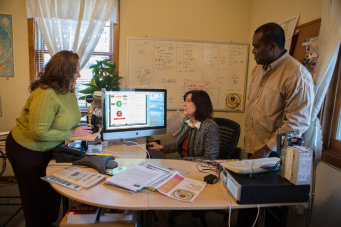 SAFETY FIRST: Find Me Safety co-founders Kim Fuller, left, and Tammy Fuller, center, with Gerald Deane. The app was launched in 2013. / PBN PHOTO/RUPERT WHITELEY