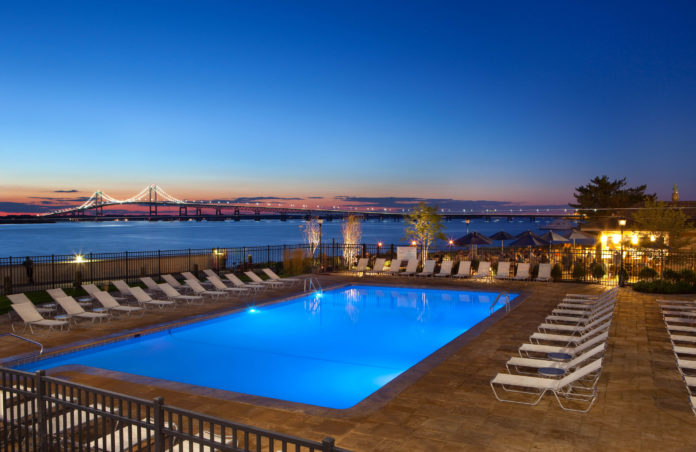 THE HYATT REGENCY NEWPORT has a clear view of the harbor and the Pell Bridge to Jamestown, one of the many qualities of the city's hotels that helped it rank No. 17 on Trivago.com's list of the Top 50 Cities to Stay in the United States. / COURTESY JOHN BELLENIS