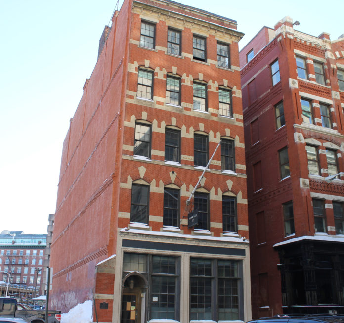 THIS OFFICE BUILDING AT 32 Custom House St. in downtown Providence will be renovated into rental apartments, with street-level commercial space, possibly a restaurant. The City Council will be asked to approve tax incentives for the proposed rehabilitation. / PBN FILE PHOTO/MARY MACDONALD