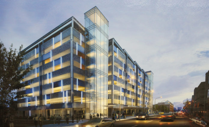 THIS IS A RENDERING OF the proposed parking garage at 342 Eddy St. for South Street Landing. The design is by architect Spagnolo, Gisness & Associates of Boston. The garage will hold 740 spaces to support the South Street Landing tenants.