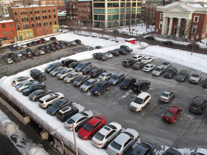 DEVELOPER, AND FORMER PROVIDENCE MAYOR, Joseph R. Paolino Jr. has purchased the 25,000-square-foot parking lot in the far left bordered by Chapel, Show and Weybosset streets in Providence for $500,000. He already owned the parking lot and deck to the right bordered by Chapel, Empire and Weybosset streets. / PBN PHOTO/MARK S. MURPHY