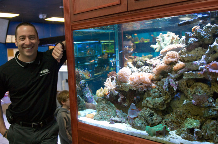 KURT HARRINGTON, founder and CEO of Something Fishy in Warwick, has signed a deal with Jordan's furniture to produce aquarium furniture in Rhode Island. / PBN FILE PHOTO/BRIAN MCDONALD