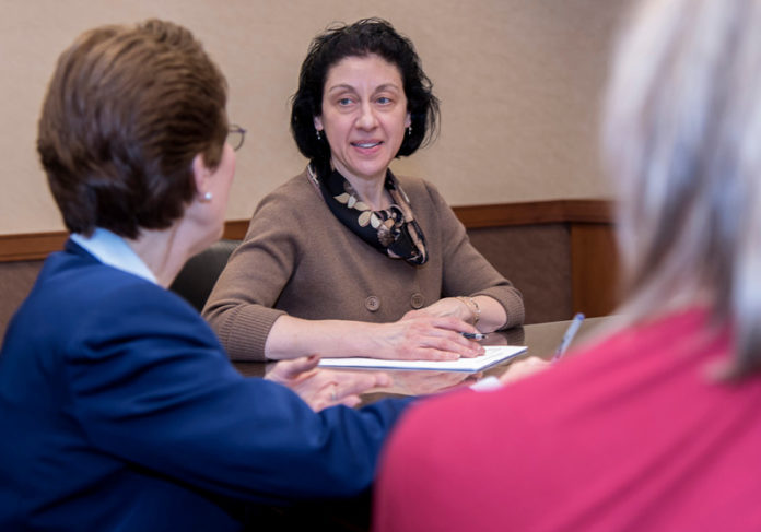 DRIVING FORCE: Ann Marie Fillion, CPA and principal at BlumShapiro, started out as a staff accountant at Sullivan & Co. in Providence in 1982. She's thrived in the industry in part because of a desire to help smaller businesses and nonprofits alike. / PBN PHOTO/?MICHAEL SALERNO