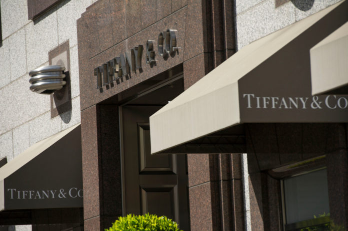 TIFFANY & CO.'s net income amounted to $196.2 million, or $1.51 a share, in the fourth quarter, which ended Jan. 31. That compares with a loss of $103.6 million, or 81 cents, a year earlier, when an arbitration award to Swatch Group AG increased costs. / BLOOMBERG FILE PHOTO/DAVID PAUL MORRIS