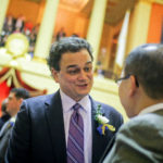FORMER R.I. HOUSE SPEAKER Gordon D. Fox converses with Cranston Mayor Allan Fung during the opening of the 2011 legislative session. Fox has agreed to plead guilty to three felony charges brought by U.S. Attorney Peter F. Neronha. / PBN FILE PHOTO/RYAN T. CONATY