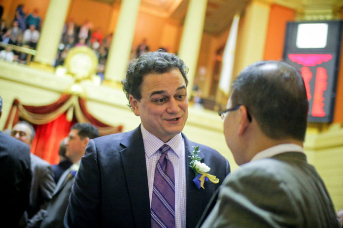 FORMER R.I. HOUSE SPEAKER Gordon D. Fox converses with Cranston Mayor Allan Fung during the opening of the 2011 legislative session. Fox has agreed to plead guilty to three felony charges brought by U.S. Attorney Peter F. Neronha. / PBN FILE PHOTO/RYAN T. CONATY