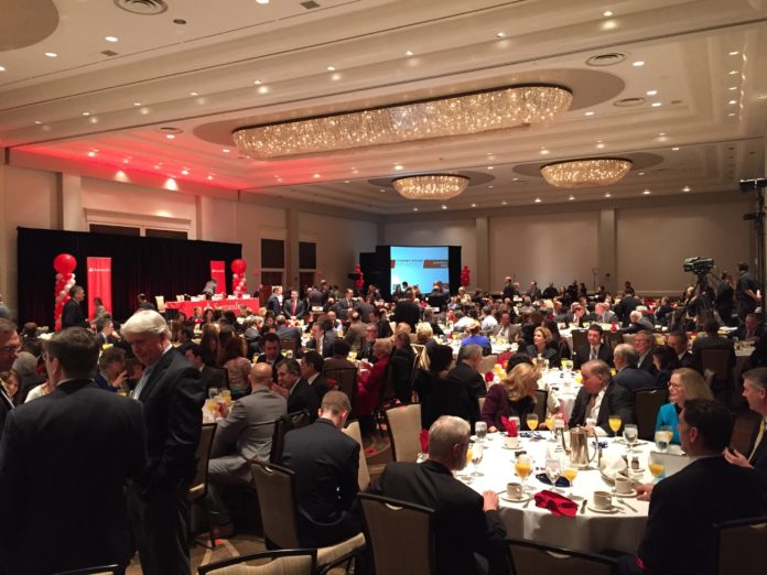 MORE THAN 300 bankers, business leaders and officials attended the Santander Bank and Greater Providence Chamber of Commerce 2015 Economic Outlook Breakfast at the Omni Providence Hotel on Tuesday. / PBN PHOTO/ELI SHERMAN