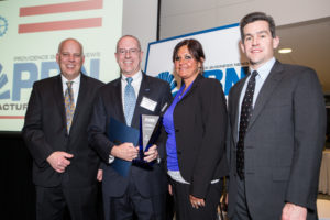 Mike Brandmeier and Lisa Ahart, Toray Plastics, accept the award for Outstanding Safety Performance / Rupert Whiteley