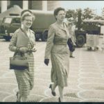 JANE C. EBBS, right, is seen walking in this photo from 1960 with an unidentified woman. Ebbs, a Newport native who died in December, has left $1 million in bequests collectively to the Redwood Library and Athenaeum and the University of Rhode Island. / COURTESY OFFICE OF THE QUARTERMASTER GENERAL