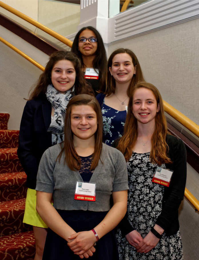 THE FIVE students who received National Center for Women & Information Technology awards for aspirations in computing and achievements are, in front, left to right, Paris Lopez and Zoe Schwartz, with Theodora Vessella and Amy Rudolph behind them, from left to right, and Jennifer Rivera in the back row. / COURTESY TECH COLLECTIVE