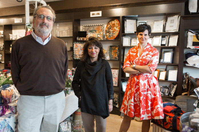 A NEW CHAPTER: Barrington Books has succeeded by adapting to changing times, introducing The Studio, where it sells high-quality, unique toys. Pictured above, from left, owners Stephen and Dana Shechtman, with General Manager Jennifer Massotti. / PBN PHOTO/RUPERT WHITELEY