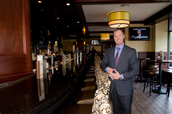 REFINED  PALATE:  McCormick and Schmick's Managing Director Joe Battafarano said that with the restaurant relaunching, standards remain high. / PBN PHOTO/ JAIME LOWE