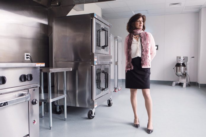 COOKED TO ORDER: Beating a life-threatening illness led Lisa J. Raiola to launch a culinary incubator last year that is breathing new life into not only her career but the careers of 30 startup entrepreneurs. / PBN FILE PHOTO/RUPERT WHITELEY
