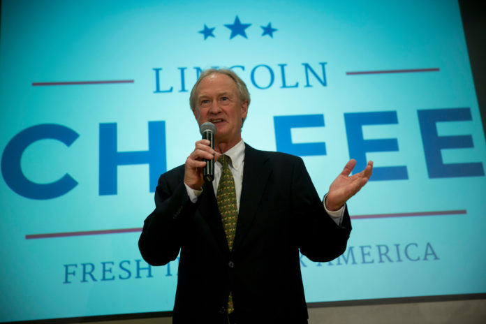 LINCOLN D. CHAFEE, former governor of Rhode Island, answers a question after announcing he will seek the Democratic presidential nomination at the George Mason University School of Policy, Government, and International Affairs in Arlington, Va. on June 3.  / BLOOMBERG NEWS FILE PHOTO/ANDREW HARRER