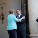Merkel warns Greece time running out to save place in euro zone FRANCOIS HOLLANDE, France's president, right, embraces Angela Merkel, Germany's chancellor, as she departs Elysee Palace following a meeting in Paris on Monday. Merkel said "time is running out," as she and Hollande responded to Sunday's referendum in Greece. / BLOOMBERG NEWS PHOTO/CHRISTOPHE MORIN