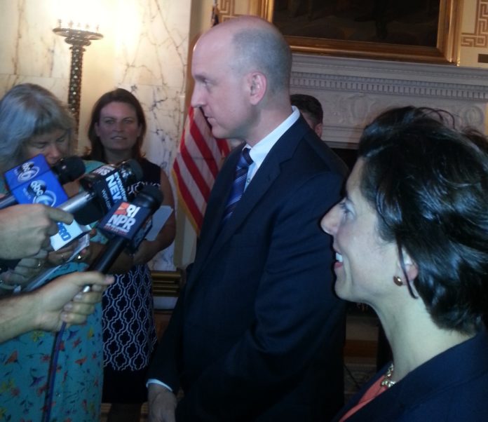 KEN WAGNER, deputy education commissioner in New York state, answers questions with Gov. Gina M. Raimondo, right, on Wednesday at the Statehouse.  Wagner is Raimondo's choice for commissioner of elementary and secondary education. / PBN PHOTO/PATRICIA DADDONA