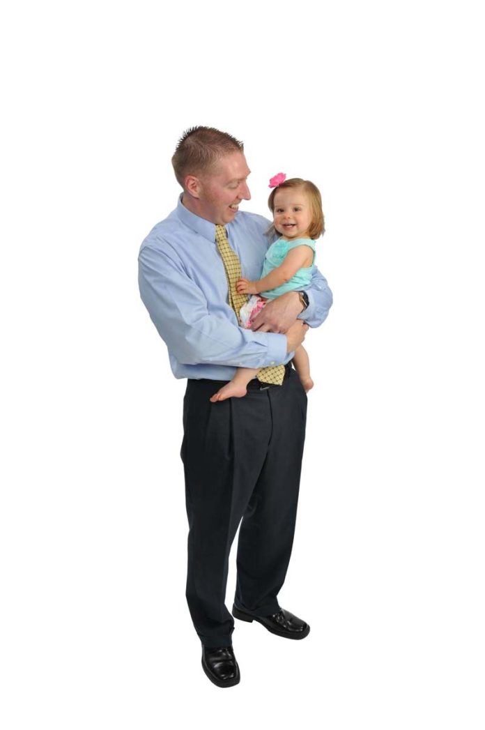 THE PROP: Peter M. Gervais considers himself fortunate to work for a firm that allows him to enjoy his 1-year-old daughter, Kendall.