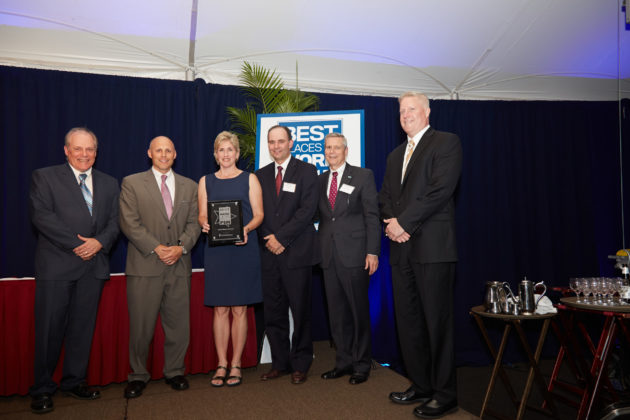 Executives from Amica Mutual Insurance Sam Palmisano, Jilly Andy, Scott Boyd and Bob DiMuccio accept their award / Photography by Casey