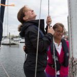 Sailing schools build R.I. reputation LEARNING THE CRAFT: Narragansett Sailing LLC instructor Jan Moiz, right, works with student Marjoliane Marcotte, a student from Canada, in July. / PBN PHOTO/RUPERT WHITELEY