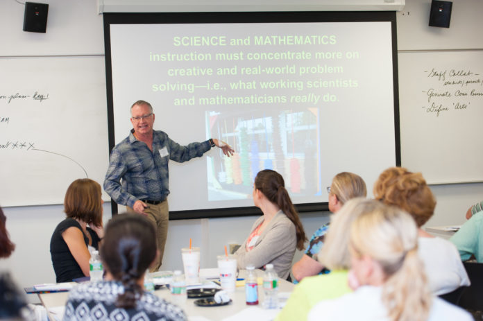 CATHOLIC SCHOOL teachers and administrators are shown participating in STEAM training workshops at Roger Williams University School of Continuing Studies earlier this summer. / COURTESY ROGER WILLIAMS UNIVERSITY