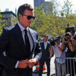 TOM BRADY, quarterback for the New England Patriots, center, arrives at federal court in New York on Aug. 12. A U.S. District Court judge on Thursday overturned Brady's four-game suspension for using underinflated footballs in a January playoff game.
 / BLOOMBERG NEWS FILE/ LOUIS LANZANO