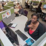 THE HUMAN TOUCH: Alliance Security's growth has been driven by its investment in employees, says the company. They include Latrina Crim, a customer service representative at the security and smart-home technology firm's Cranston offices. / PBN PHOTO/MICHAEL SALERNO