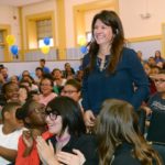 Pawtucket English teacher garners Milken Educator Award for 2015 KENDRA BORDEN, making her way to the stage at Samuel Slater Junior High School in Pawtucket Wednesday morning, was awarded $25,000 by the Milken Family Foundation for being named Rhode Island's 2015 Milken Educator Award winner. / COURTESY MILKEN FAMILY FOUNDATION