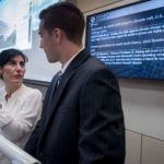 WELl STOCKED: Asli Ascioglu, left, professor of finance at Bryant University, instructs student Jack Grant, a senior from Rocky Hill, Conn., during a portfolio management class in the Archway Investment Fund program. / PBN PHOTO/ MICHAEL SALERNO