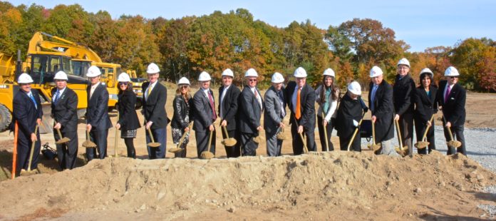 Officials associated with St. Elizabeth Home break ground for four new, small-footprint nursing homes on Oct. 27.