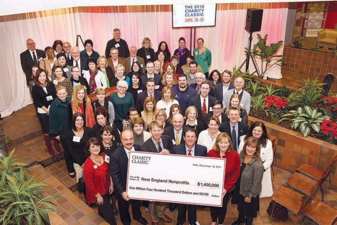 BIG IDEA, BROAD SUPPORT: The yearly CVS Health Charity Classic golf tournament benefits nearly 80 local nonprofits. Last year's event ended up contributing $1.4 million to the organizations, adding to the total of more than $18 million since its inception in 1999. Holding the check are, from left, CVS President and CEO Larry J. Merlo, professional golfer and event co-host Brad Faxon, pro golfer and co-host Billly Andrade, CVS Senior Vice President of Corporate Social Responsibility and Philanthropy Eileen Howard Boone, plus CVS Senior Director of Community Relations Faith Weiner at far right. / COURTESY CVS HEALTH