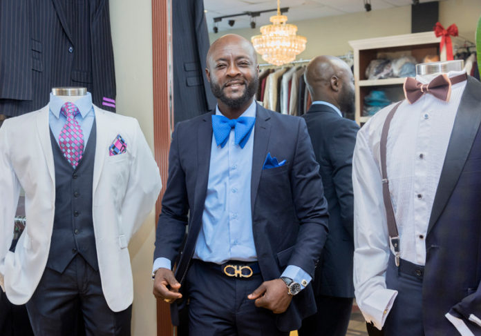WEAR IT WELL: Frank Ankoma opened Copa Menswear in Providence to provide one-stop shopping for men seeking business or special-occasion wear. / PBN PHOTO/MICHAEL SALERNO