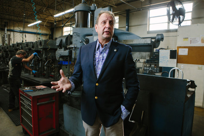 GO LEAN: Karl Wadensten, president of VIBCO Vibrators, is a proponent of lean processing, which eliminates waste and unneeded steps. He said the principles of lean processing can be applied to Rhode Island's agencies. / PBN PHOTO/RUPERT WHITELEY