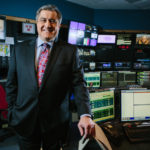 ‘We’re all waiting for a breakthrough’ GIVING R.I. A VOICE: News anchor and radio personality Gene Valicenti says Rhode Island needs a unified way to promote itself and must address budget cutting. / PBN PHOTO/RUPERT WHITELEY