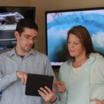 Workforce shifting with speed, variety of services MORE THAN MAINSTREAM: Jamie Griffin, Full Channel's director of technology, shows Jodi Kopecky, a Full Channel customer from Warren, how to stream video on a tablet with Full Channel's TV Everywhere platform at the firm's office in Warren. Video streaming has contributed to a consumer demand for higher Internet speeds. / COURTESY MATTHEW HARWOOD/FULL CHANNEL INC.