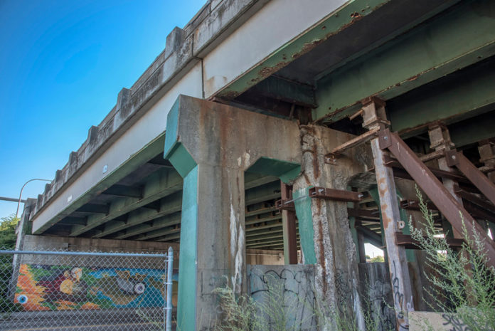 WHAT REALLY MATTERS: The poor condition of one of the Route 6 and 10 bridges in Providence's Olneyville neighborhood requires extensive support to remain open. / PBN FILE PHOTO/ MICHAEL SALERNO