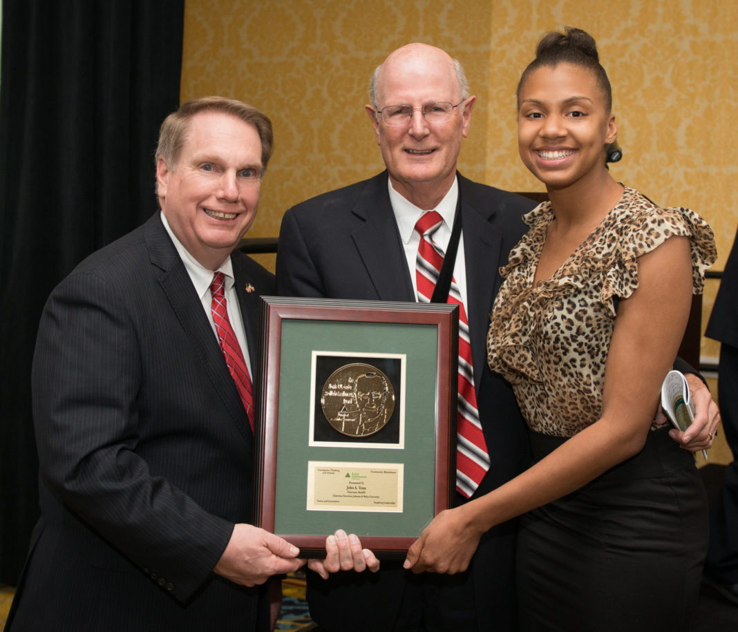 JA&rsquo;s Education Committee Chairman, Steve Kitchin of New England Tech, presents BankRI Chairman John Yena with his 2014 award. With Dr. Yena is Jeira Titon, a student from The Met Center for Innovation and Entrepreneurship.