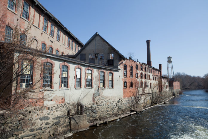 REDEVELOPMENT OF the historic Pontiac Mills into residential and commercial space has begun, according to the project manager. / PBN FILE PHOTO/RUPERT WHITELEY