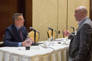 Panelist Tim Hebert Atrion talks with Nino Granatiero, Granatiero & Associates