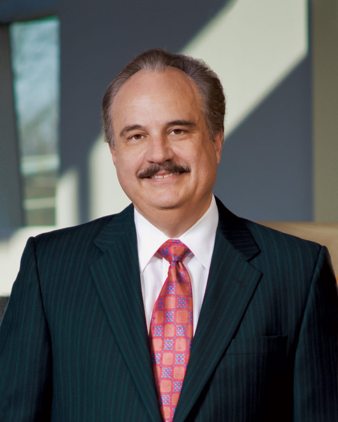 CVS HEALTH Corp. President and CEO Larry Merlo  saw his compensation fall last year to $28.9 million. It was $32.3 million in 2014. / COURTESY CVS