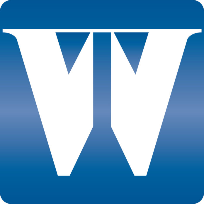 WASHINGTON TRUST BANCORP reported Wednesday a slight dip in earnings, although continued growth in wealth management assets and loan activity helped the Westerly-based bank show a 5.2 percent increase in total revenue. 