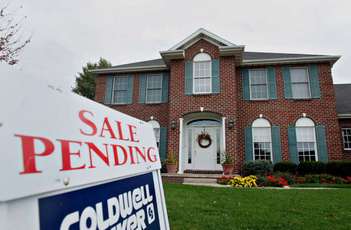 SINGLE-FAMILY HOME sales rose nearly 37 percent in February, according to The Warren Group. / BLOOMBERG FILE PHOTO
