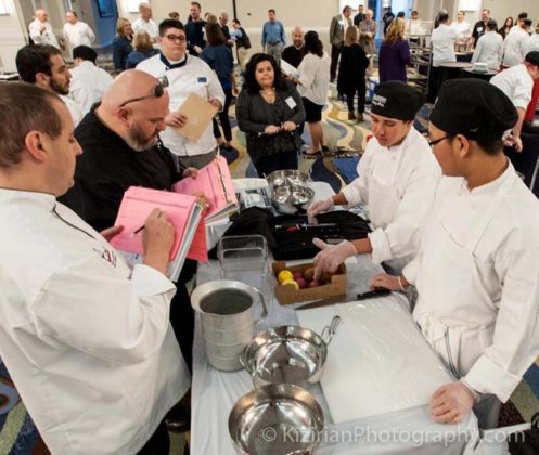 MAKING THE CUT: Sophomore students from Chariho Area Career &amp; Technical Center explain what type of knife cut they will be demonstrating to technical-skills judges Chef Instructor Ray McCue of Johnson &amp; Wales University, foreground, and Executive Chef Eric Steinhauer of the Newport Marriott Hotel. / COURTESY RICHARD KIZIRIAN/KIZIRIAN PHOTOGRAPHY