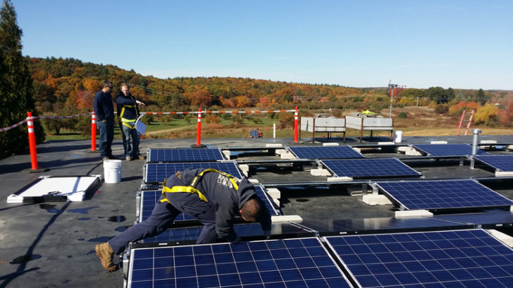 GROWING INDUSTRY: The number of solar-installation companies entering the Rhode Island market is growing, as net-metering caps are met in other New England states. / COURTESY E2SOL LLC