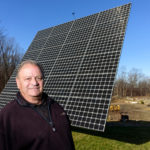 LOCAL GRID: Arnold Abatecola, a net-metering energy producer, spent $35,000 on a dual-axis tracking system three years ago. His monthly electricity bill has fallen about 75 percent. / PBN PHOTO/ MICHAEL SALERNO