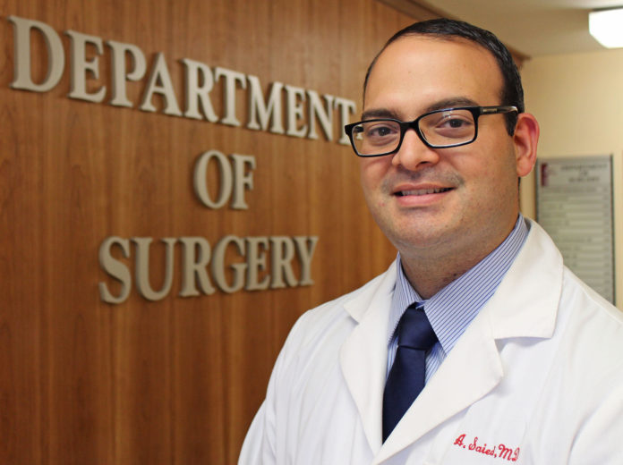 Dr. Abdul Saied Calvino, a surgical oncologist at the Roger Williams Cancer Cancer, has a special interest in disparities in cancer care. / RAY DAVEY/ROGER WILLIAMS MEDICAL CENTER