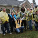 Rainy weather didn’t dampen BlueAngel volunteers’ high spirits: This group volunteered at the Groden Center during last year’s Blue across Rhode Island, Blue Cross Blue Shield of Rhode Island’s annual day of community service. / RIVERZEDGE ARTS