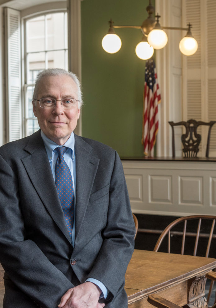 Edward Sanderson, executive director of the Rhode Island Historical Preservation and Heritage Commission, is seen at the old state capital building on the East Side of Providence.
 / PBN PHOTO/MICHAEL SALERNO